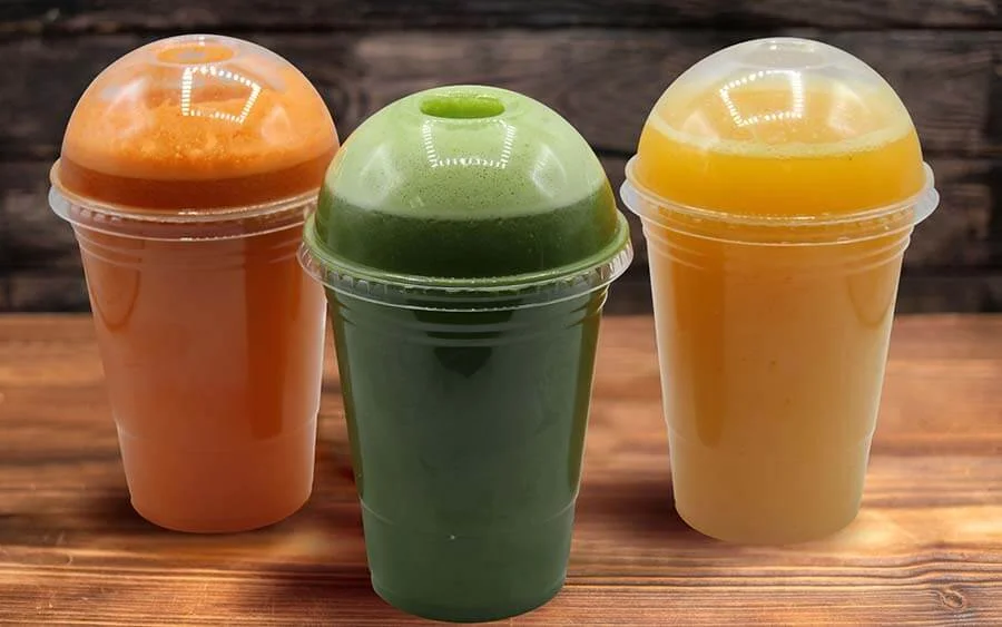 3 orange, yellow and green smoothies 