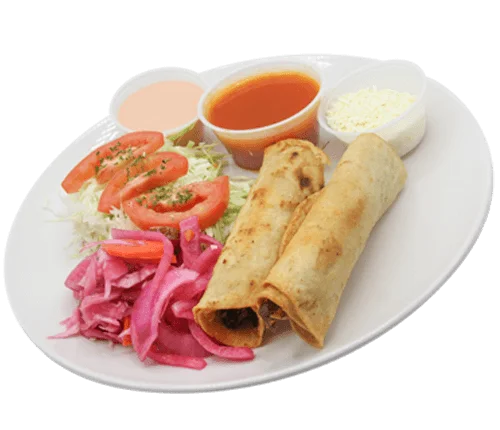 Plate with salad, burritos and three sauces on the side