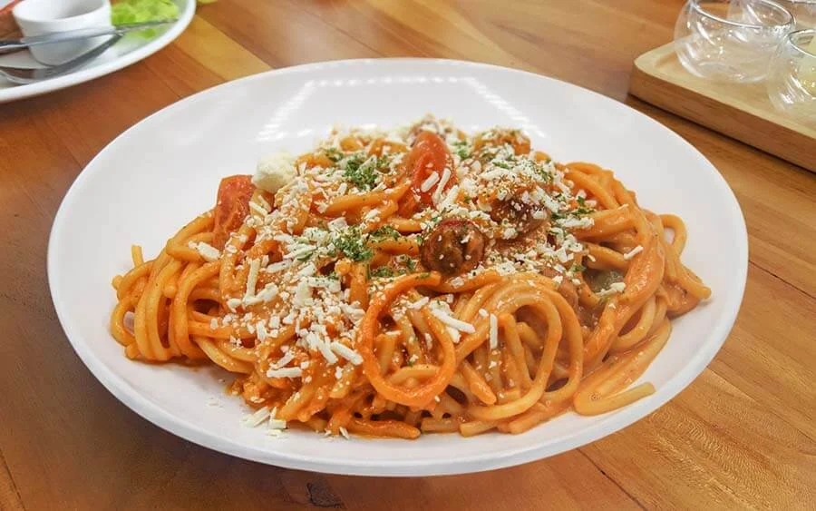 Yellow spaghetti with parmesan cheese 