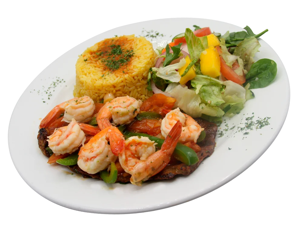 Shrimps with vegetables, yellow rice and salad